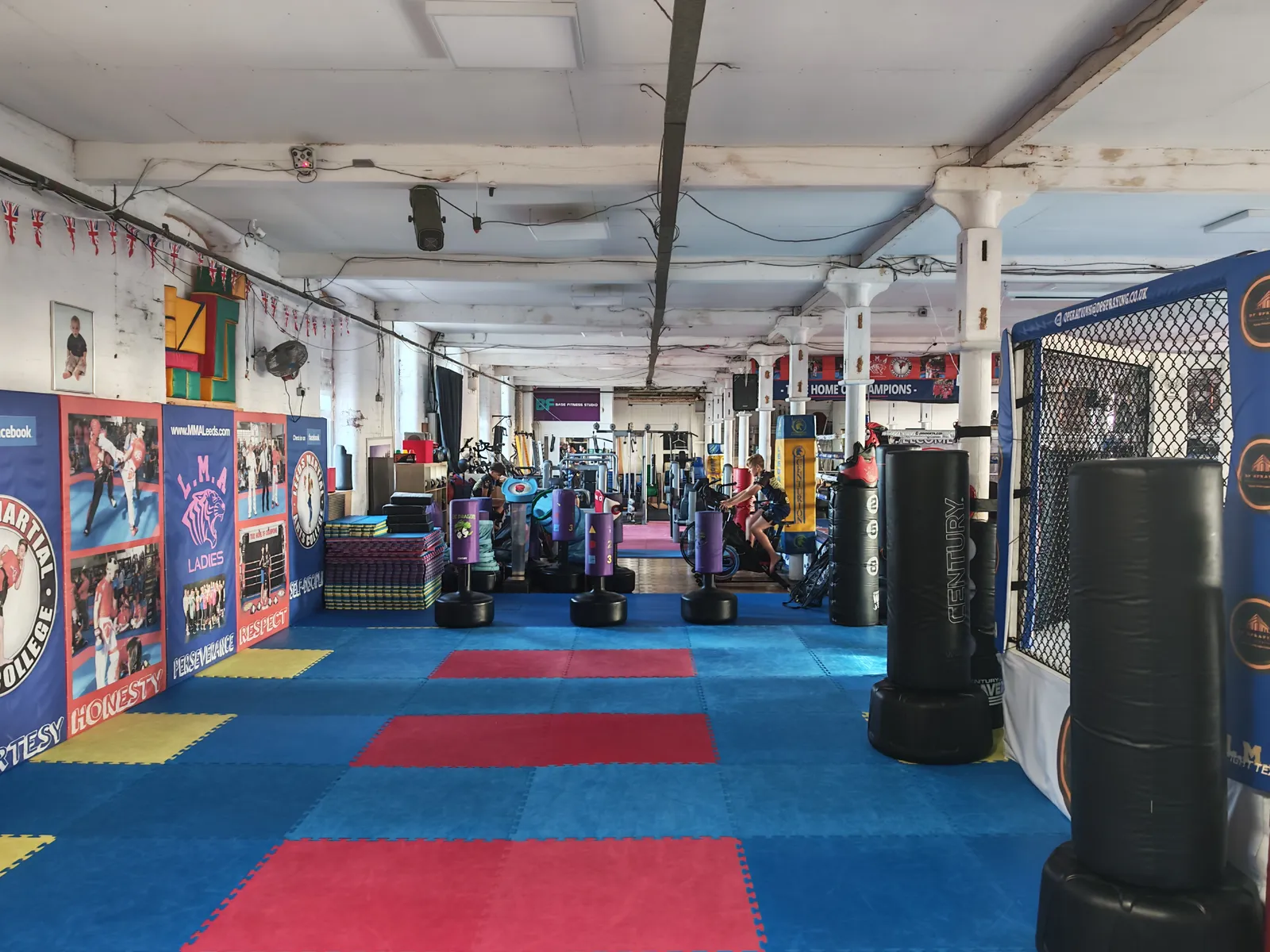 Blue and red training mats stretching through the LMA gym